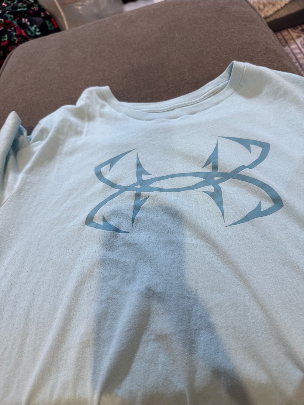 Women’s under Armour, baby blue shirt